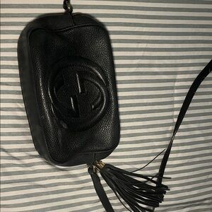 Authentic Gucci Soho Disco crossbody bag (black leather), purchased in 2019.